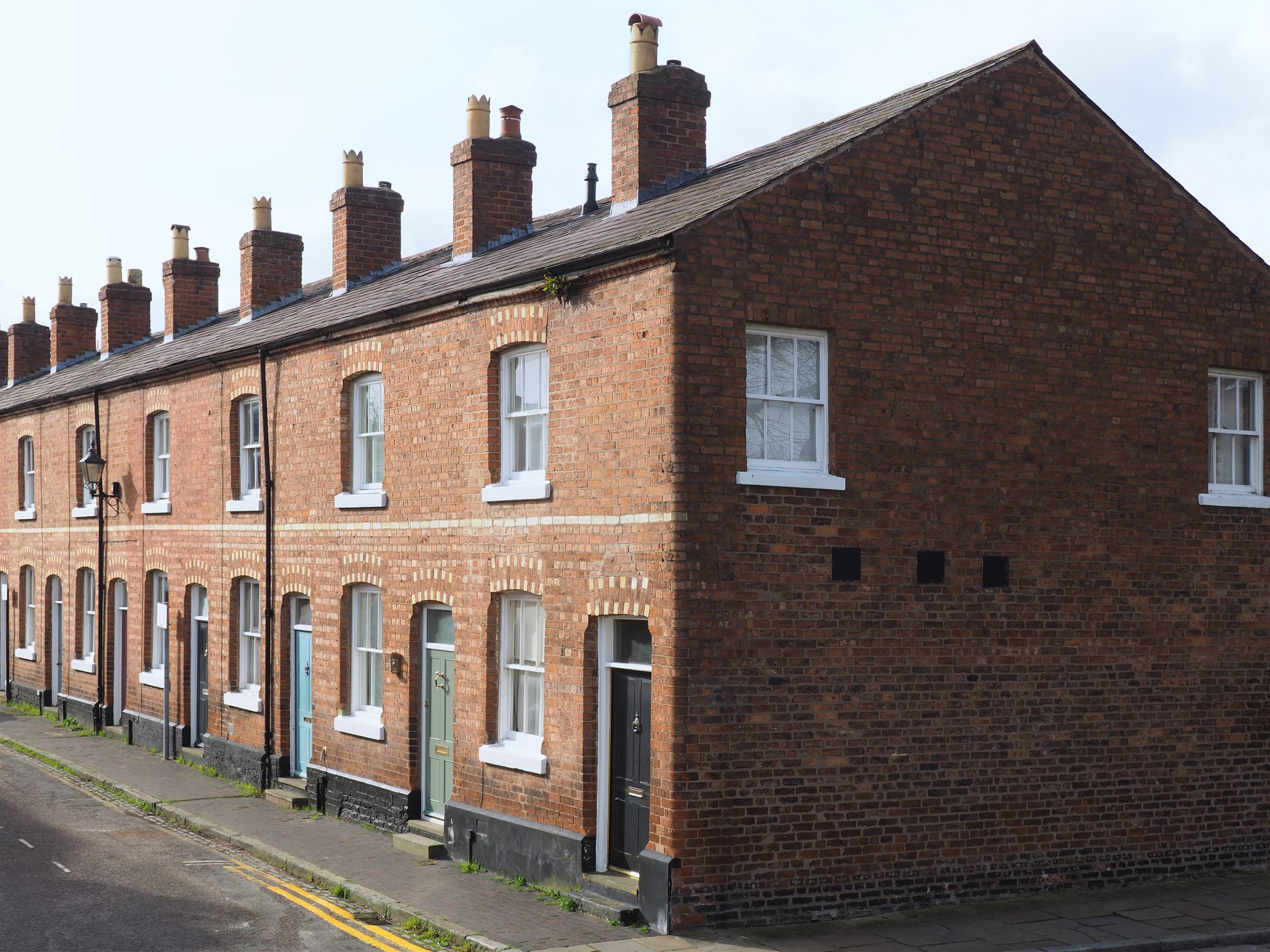 Victorian red-brick terraced houses in Cheshire, where a RICS Level 3 Building Survey is usually recommended